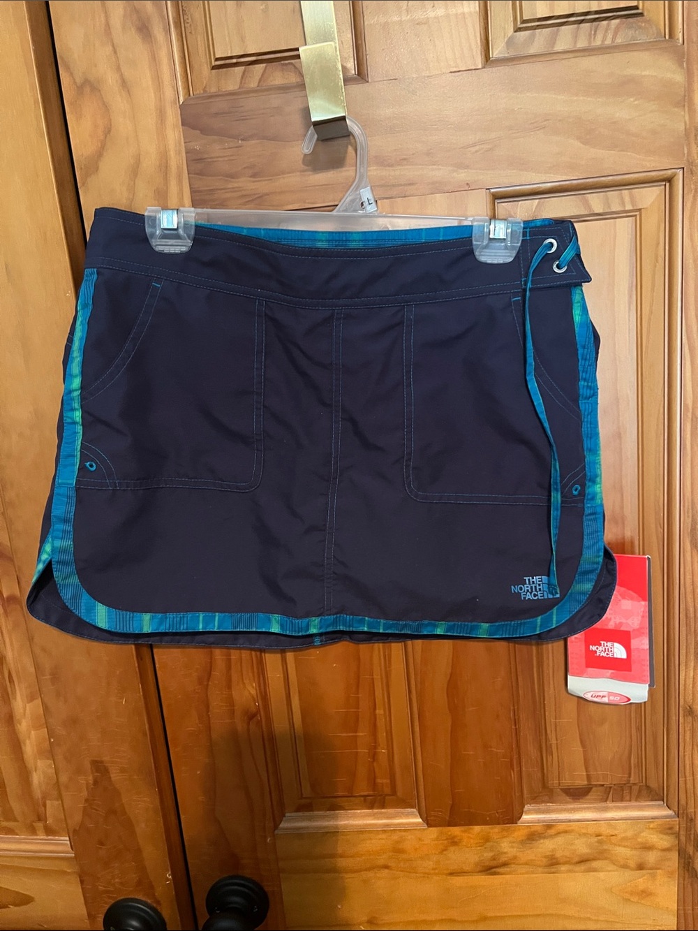 The North Face Black Mini Skirt with Teal Trim